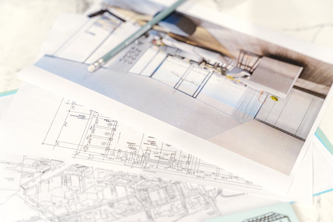 Architectural floor plan on paper showing building layout dimensions