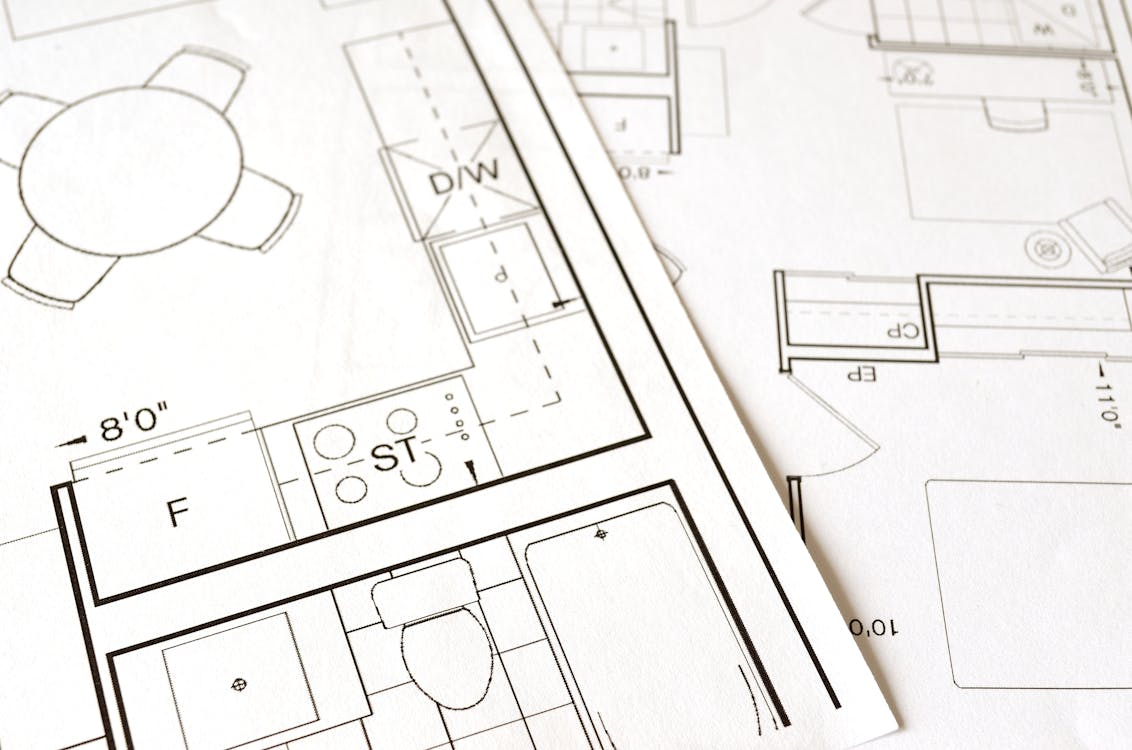 Detailed architectural floor plan showing room layouts with dimensions and fixture callouts