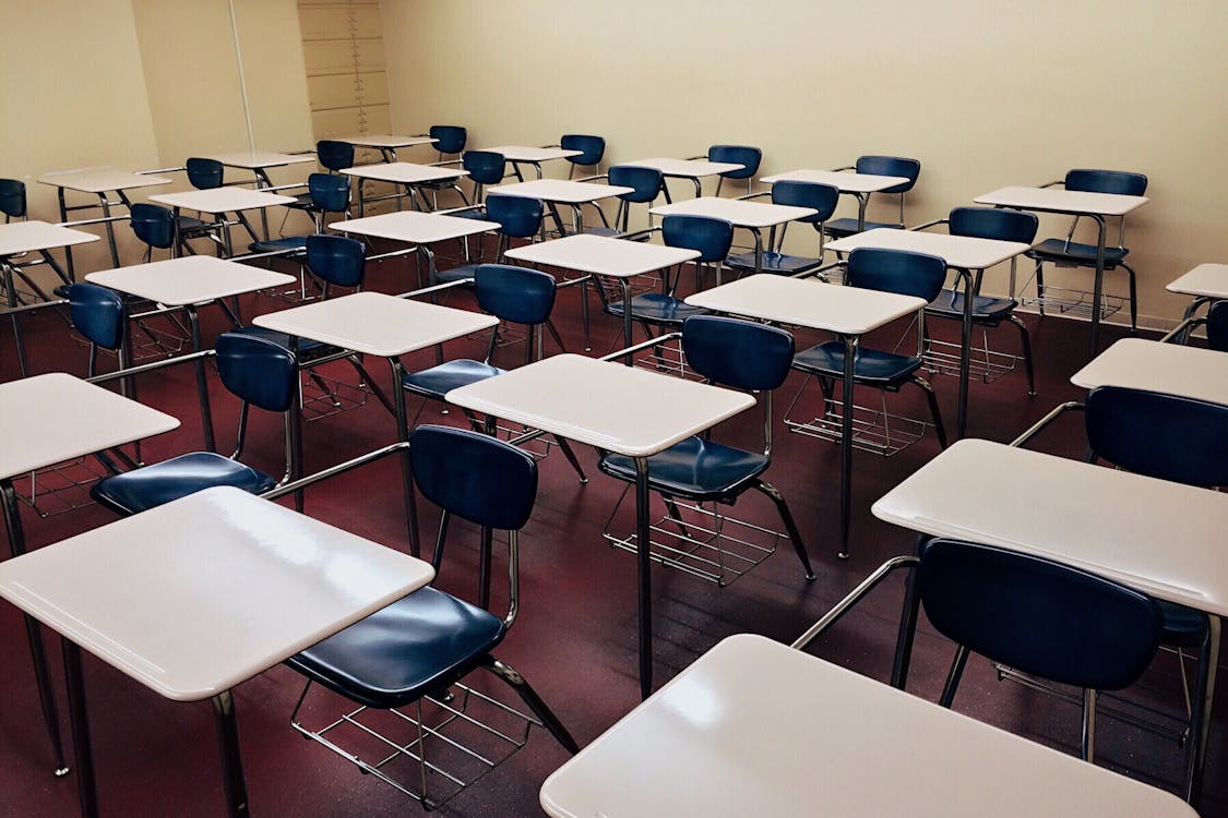 Classroom with desks arranged for young learners