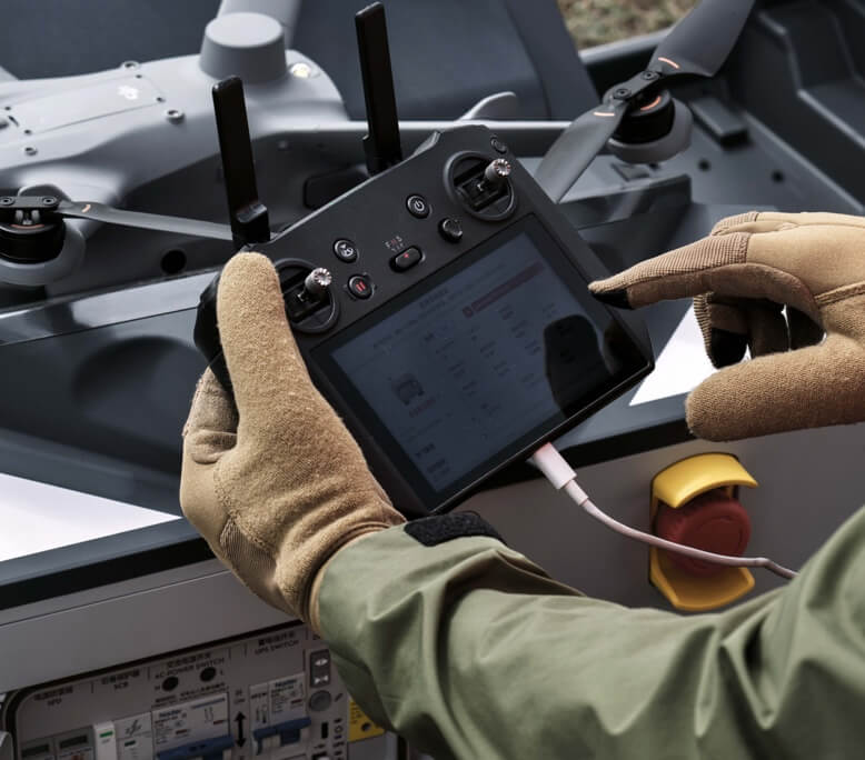 DJI Dock 2 with drone compartment open showing autonomous launch system