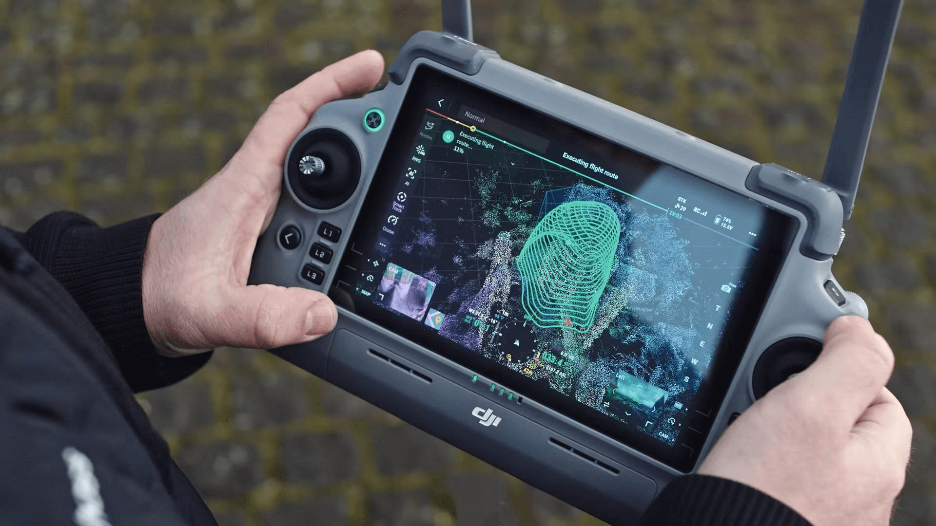 DJI RC Plus controller showing real-time 3D point cloud data visualization during a mapping mission