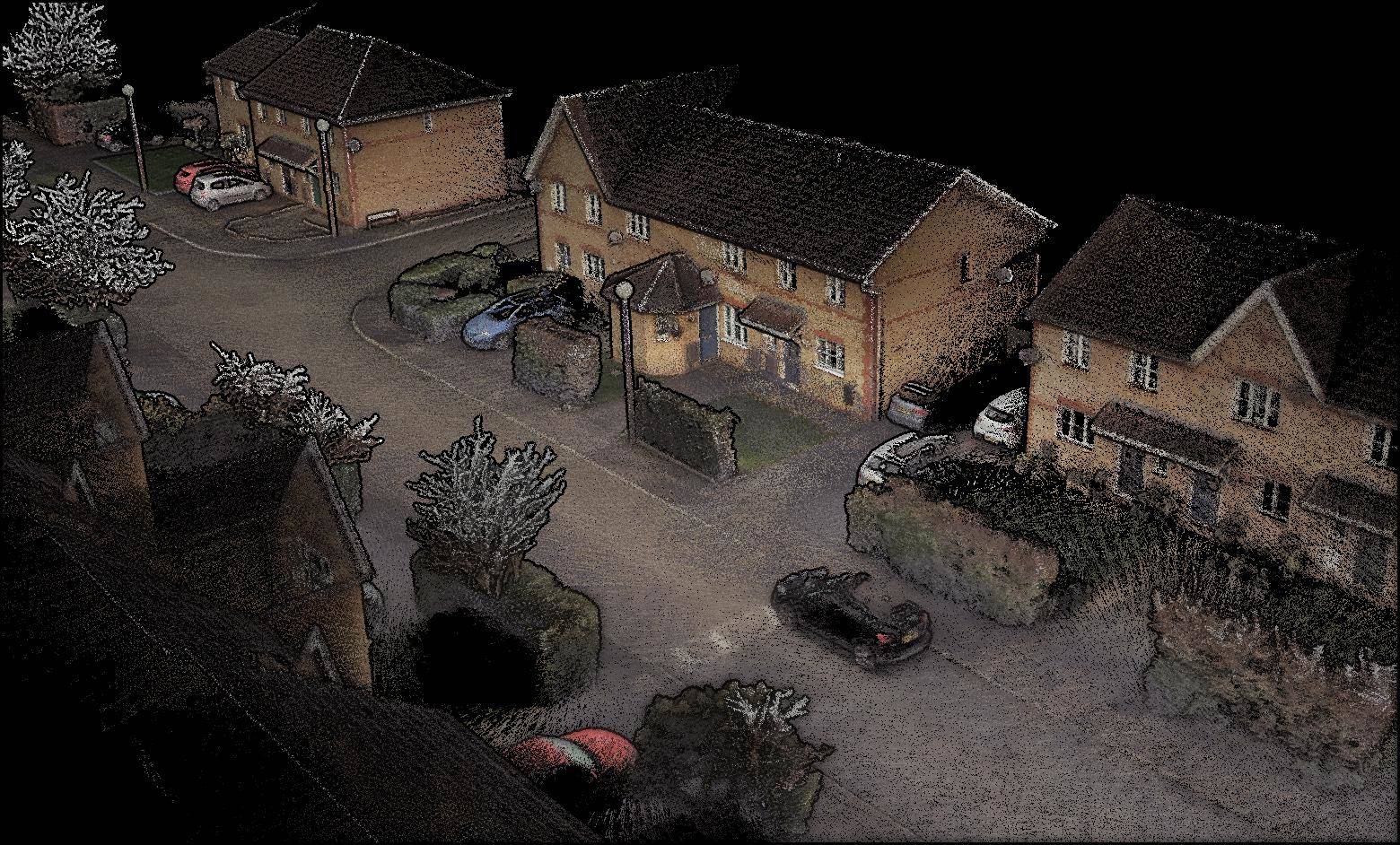 Colorized 3D point cloud of a street captured with a mobile mapping scanner