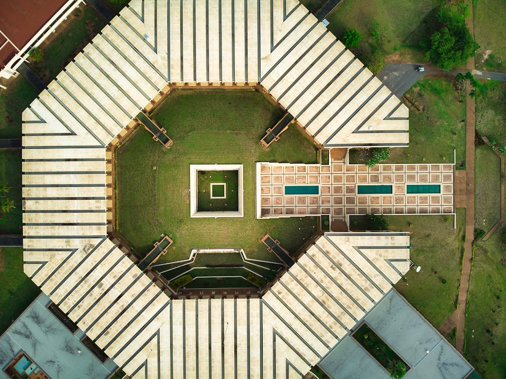 Hexagonal building captured from an aerial oblique angle showing facade detail