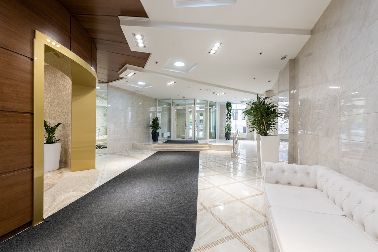 Luxury hotel lobby with marble floors and elegant seating — hospitality venues represent one of the highest-value client segments for virtual tour businesses