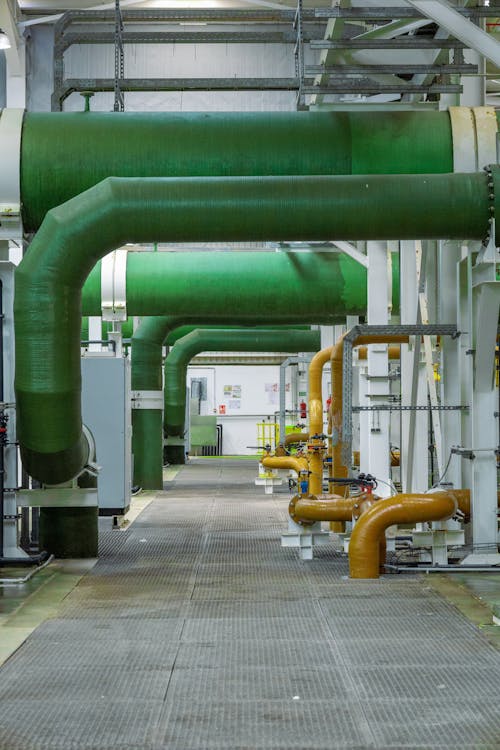 Large industrial pipes and mechanical systems inside a facility