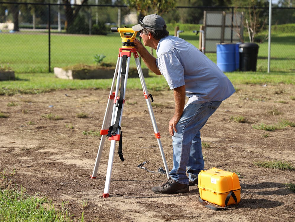 Land surveying field work with equipment