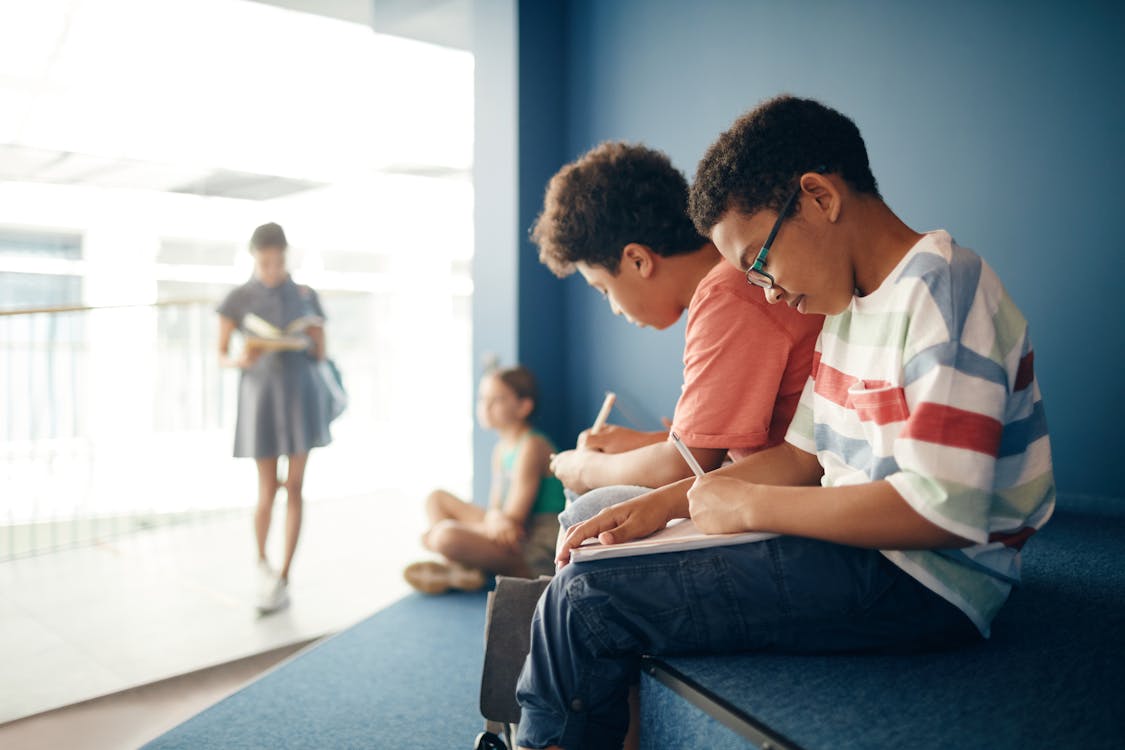 Students studying in a school hallway