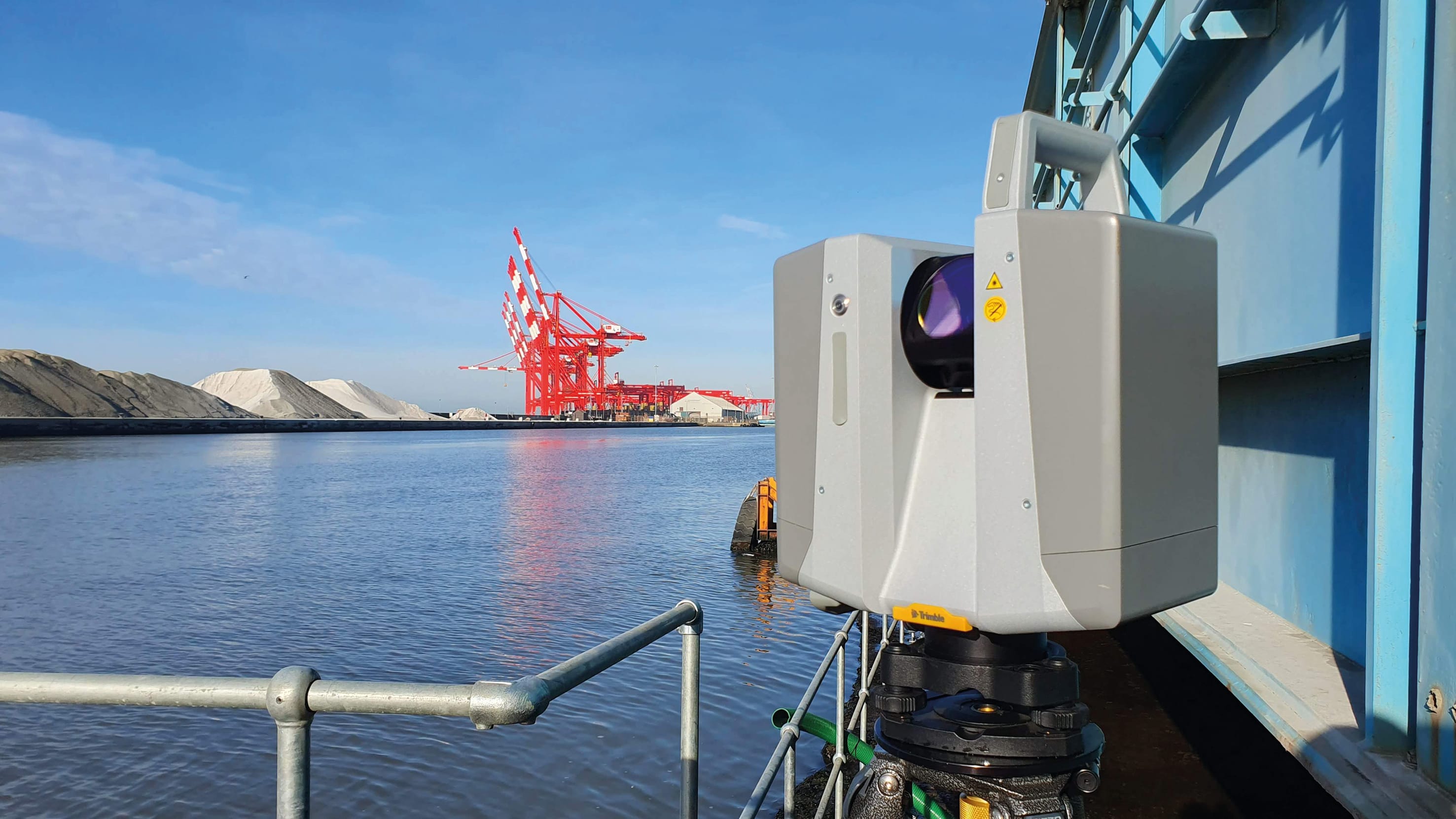Trimble X12 3D laser scanner scanning port infrastructure — modern scanning technology vs traditional survey methods