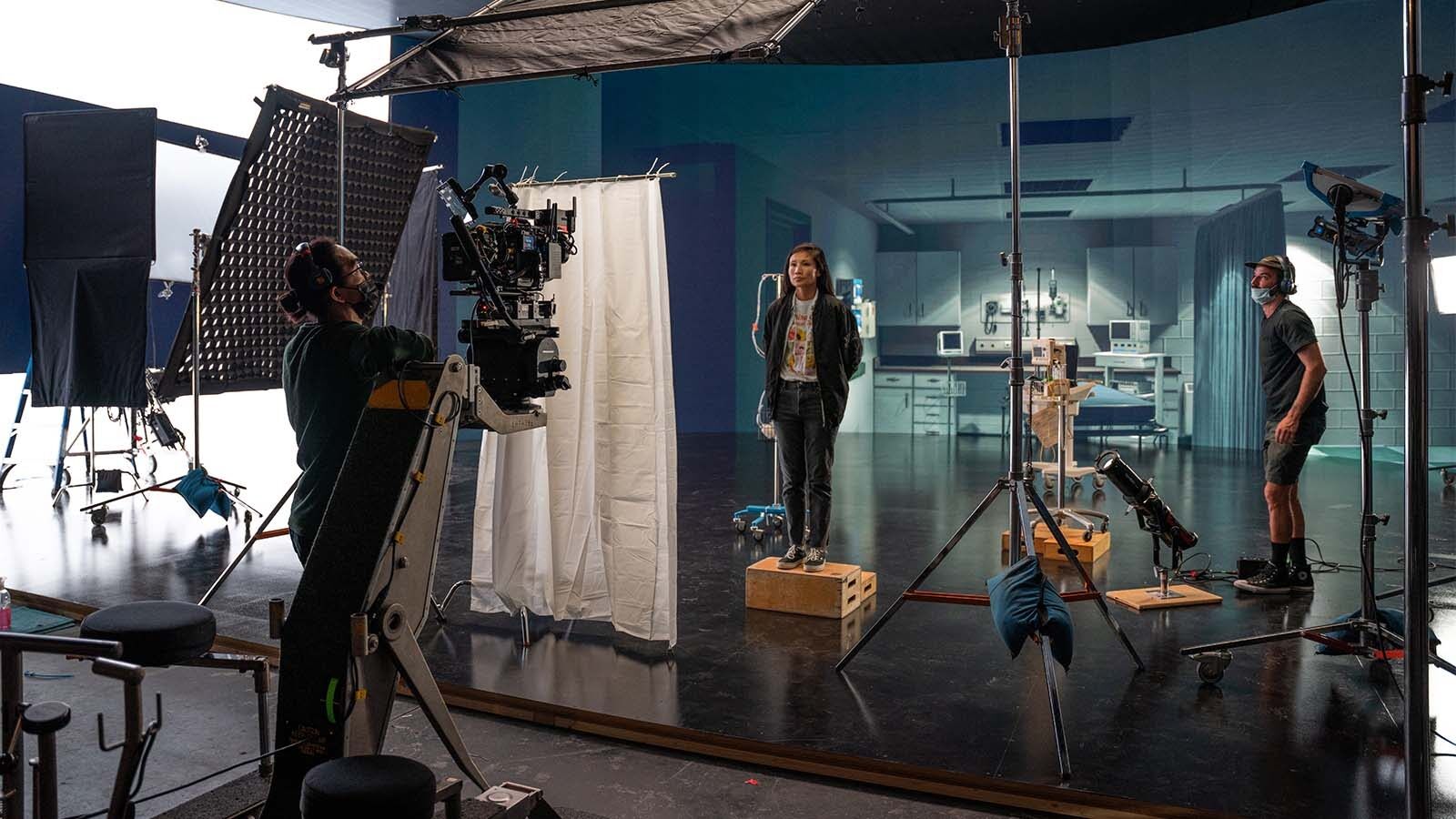Virtual production LED wall stage showing a photorealistic environment displayed in real-time for in-camera visual effects